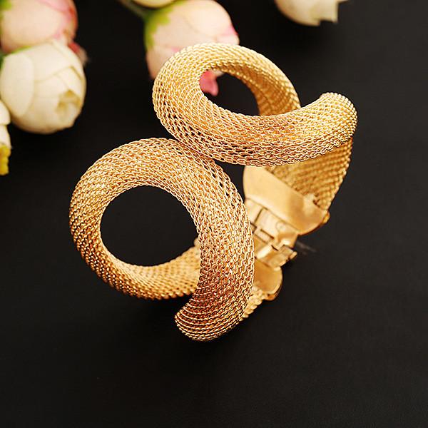 Abstract Gold Tone Hinge Bracelet