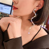 Swirling Bling Long Earrings